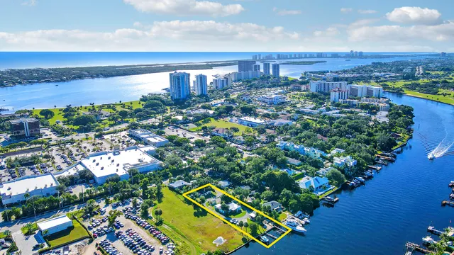 a view of a lake with a building in the background