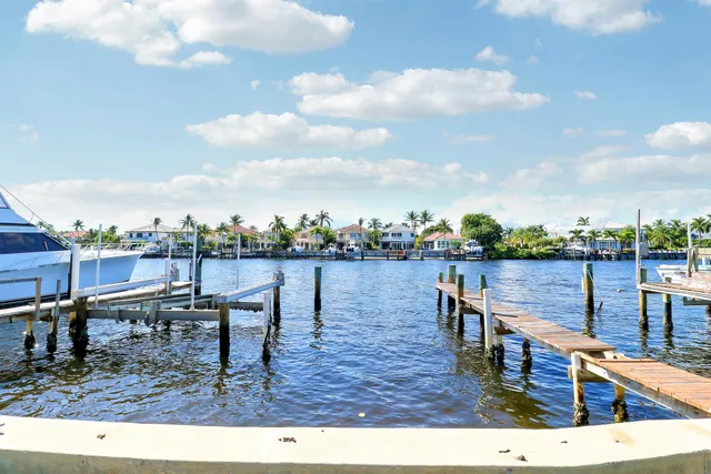 a view of a roof deck with furniture