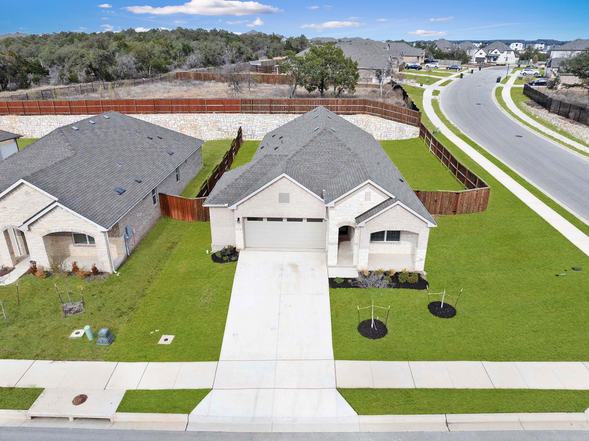 309 Barton Run Drive Georgetown, TX 78628 - Photo 2 of 35 Aerial perspective of suburban area
