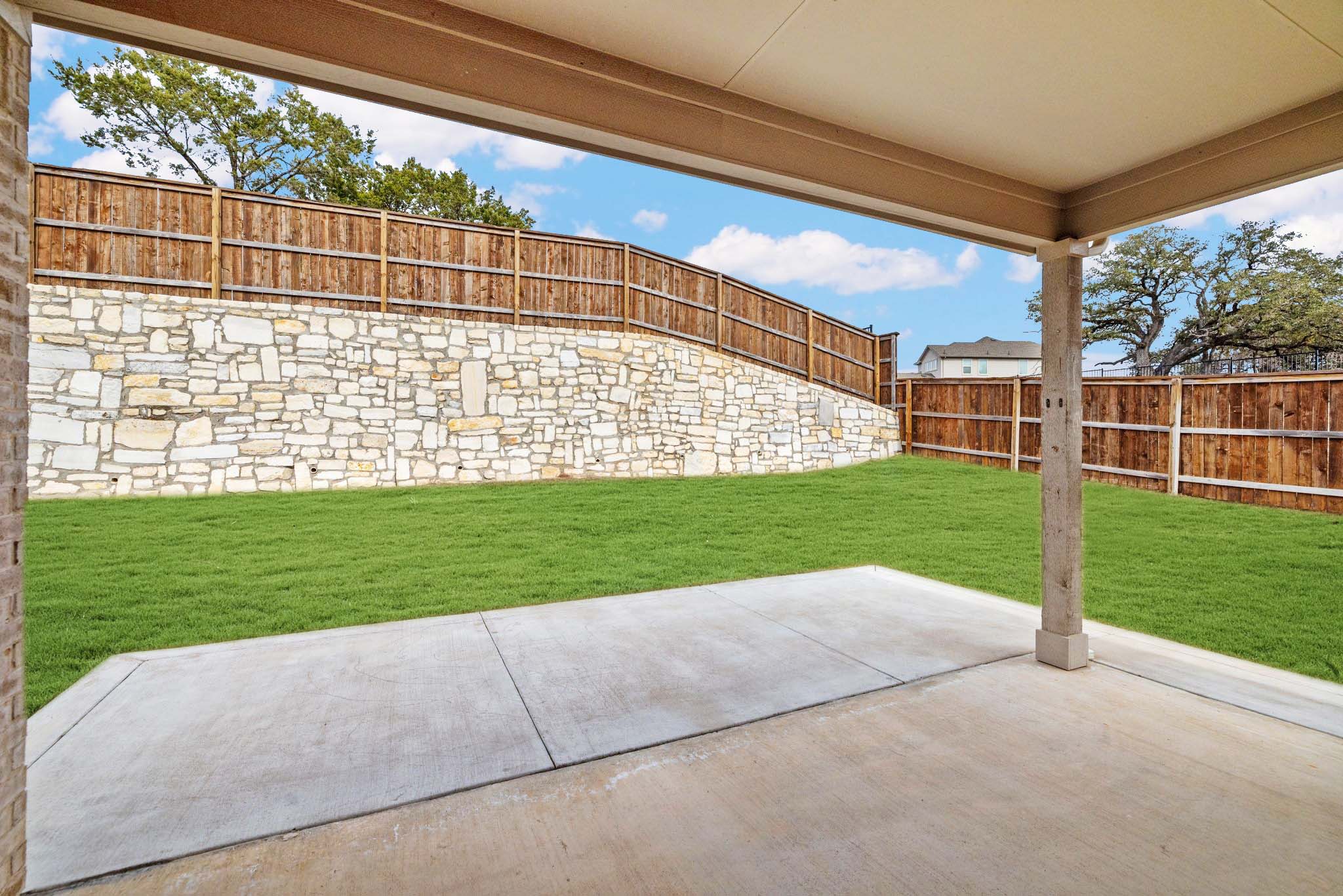 309 Barton Run Drive Georgetown, TX 78628 - Photo 23 of 35 Fenced backyard with a patio