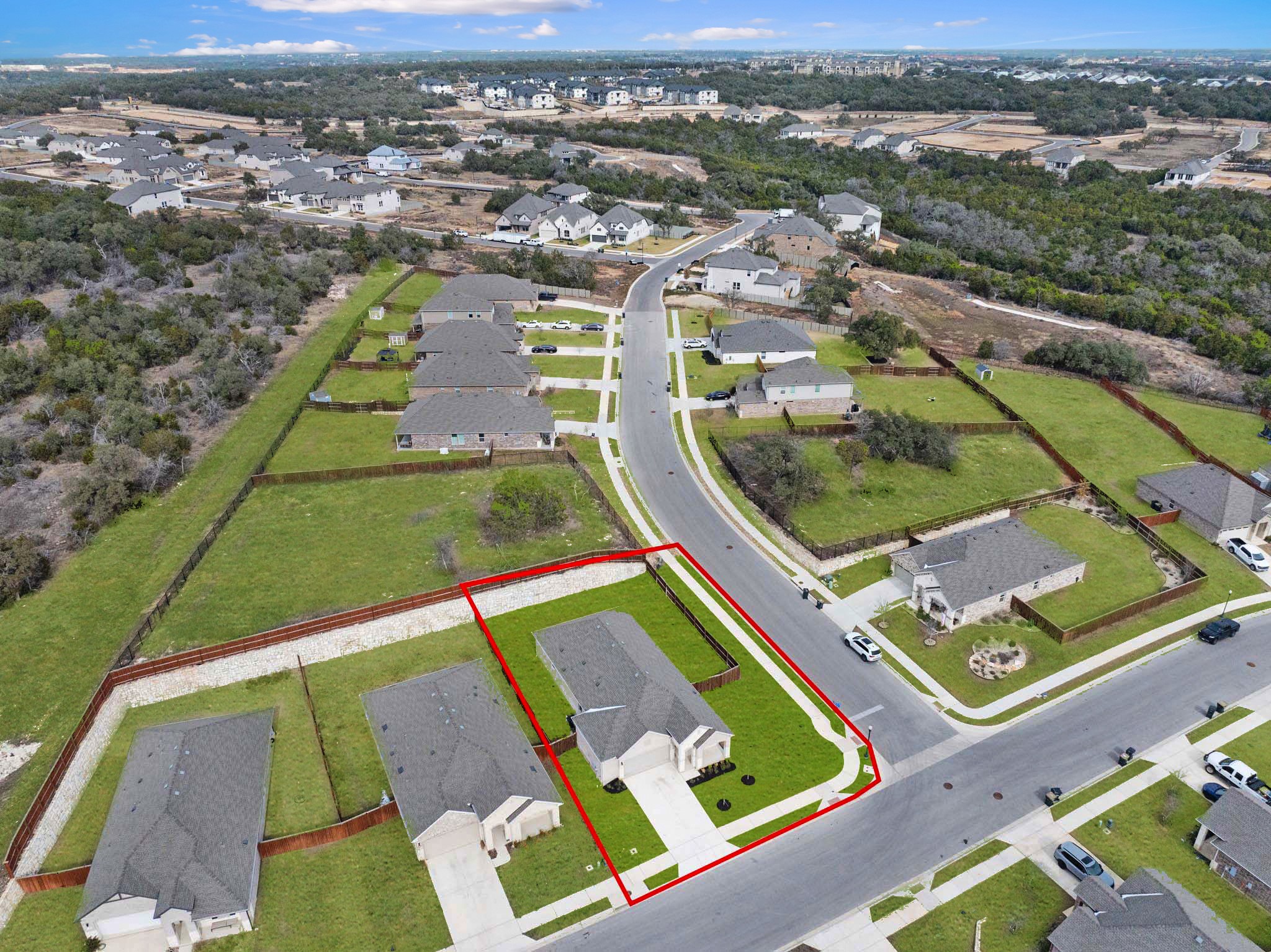 309 Barton Run Drive Georgetown, TX 78628 - Photo 30 of 35 Aerial perspective of suburban area with property parcel outlined