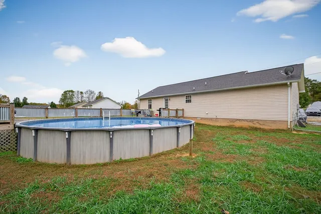 a backyard of a house with lots of green space