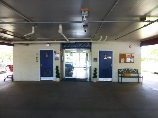 a bathroom with a shower and a window