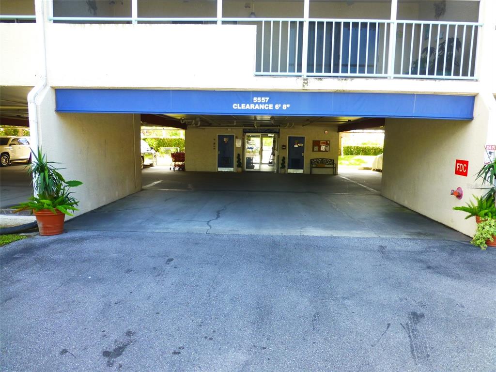 5557 Sea Forest Drive, Unit 215 New Port Richey, FL 34652 - Photo 26 of 40 a view of an entrance to house
