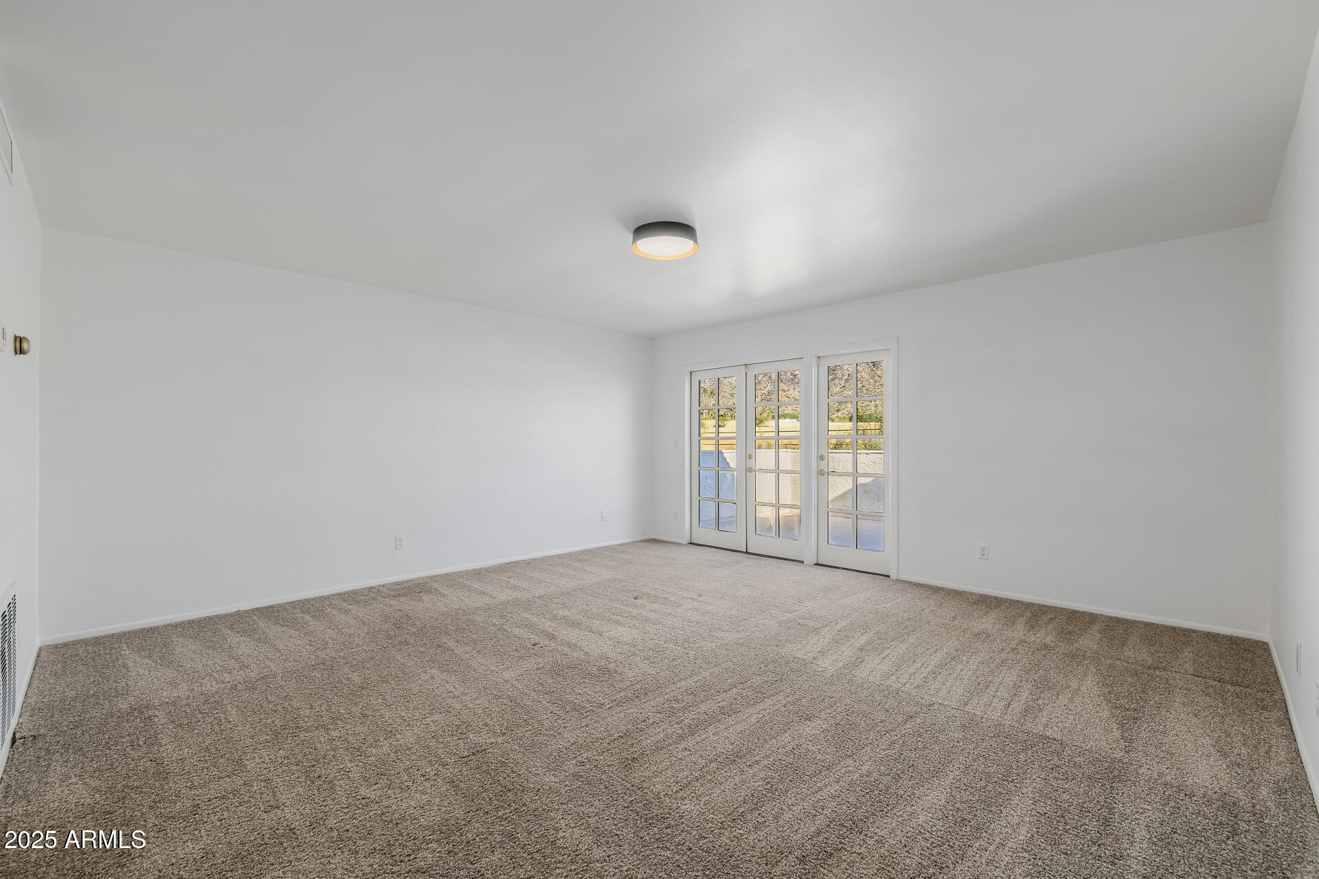 1875 East State Avenue Phoenix, AZ 85020 - Photo 16 of 39 a view of an empty room with a window