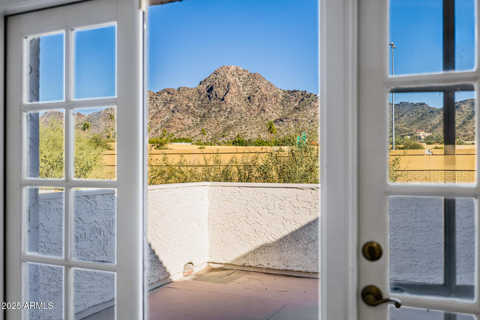 1875 East State Avenue Phoenix, AZ 85020 - Photo 17 of 39 a view of a door back yard from a window