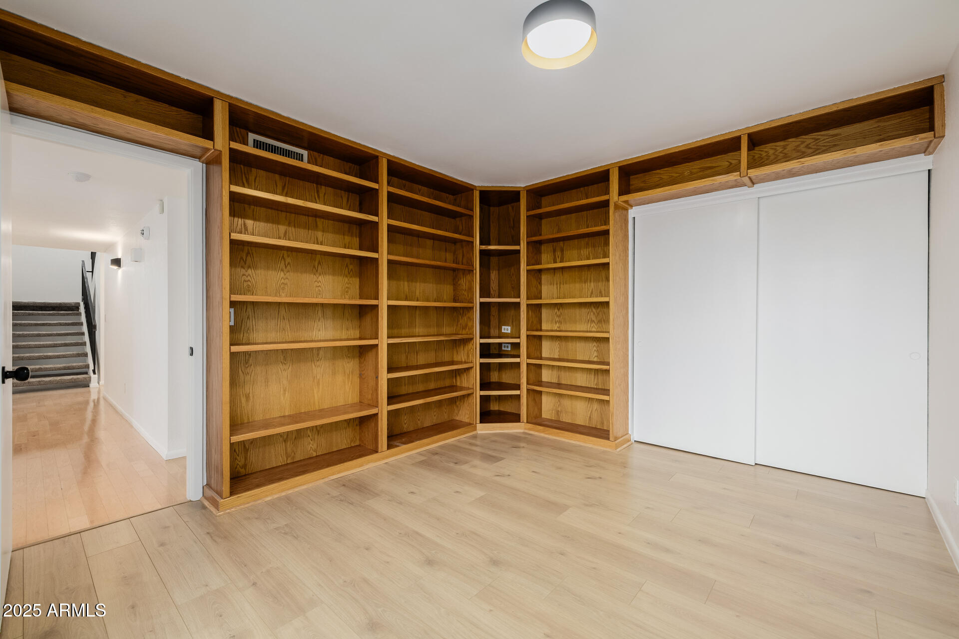 1875 East State Avenue Phoenix, AZ 85020 - Photo 29 of 39 a view of an empty room with empty shelves
