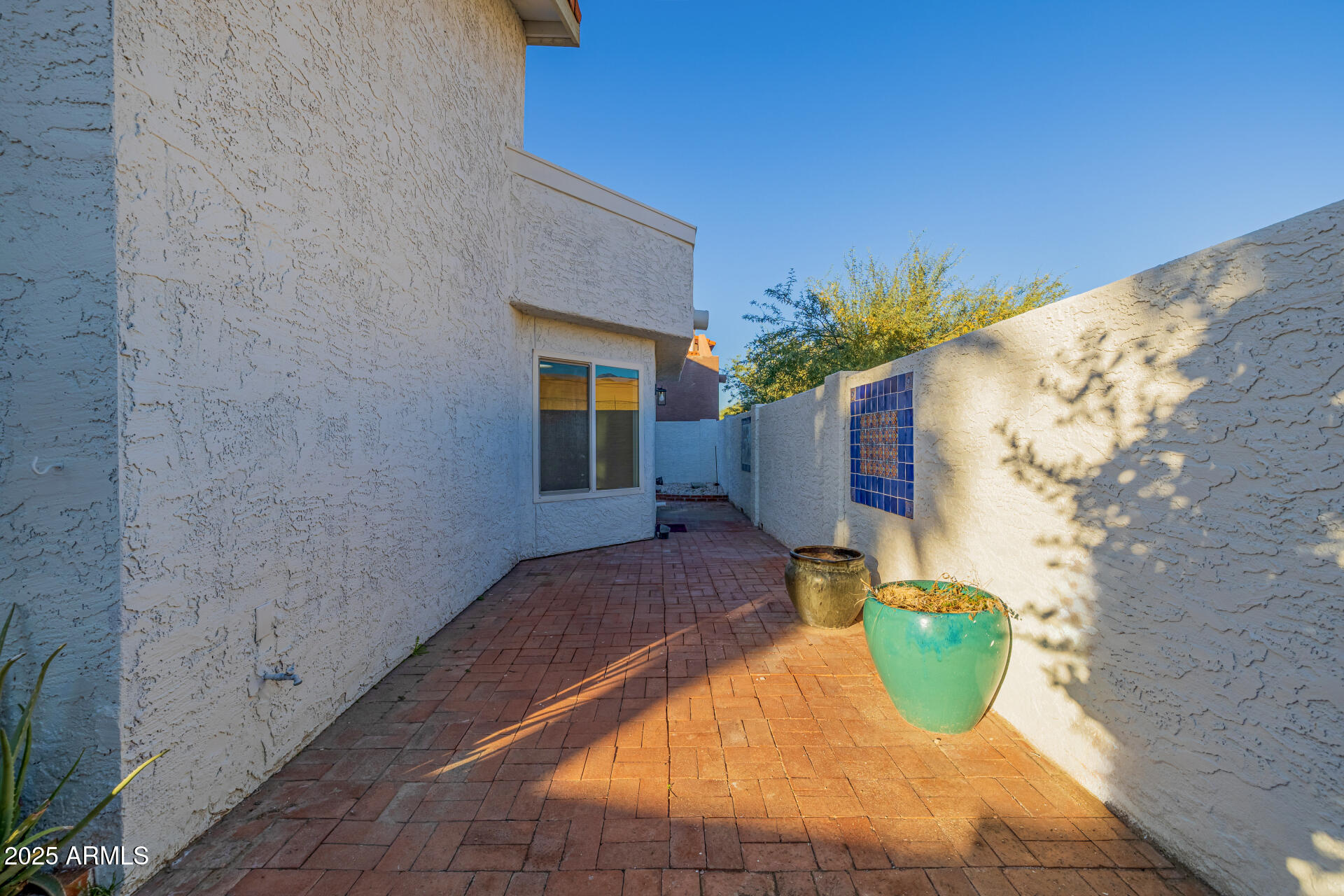 1875 East State Avenue Phoenix, AZ 85020 - Photo 34 of 39 a view of a swimming pool with potted plants