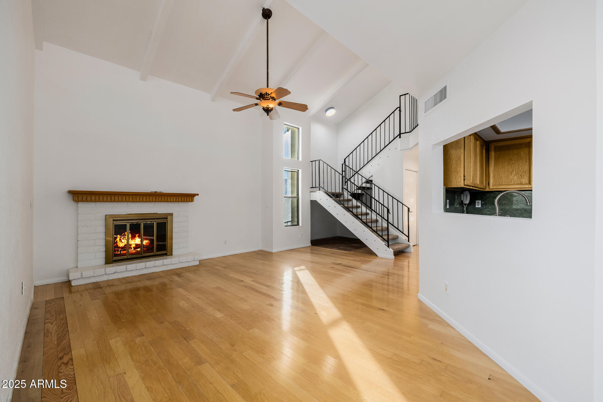 1875 East State Avenue Phoenix, AZ 85020 - Photo 7 of 39 a view of an empty room with a fireplace