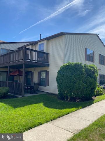 27 Pickwick Place Sewell, NJ 08080 - Photo 3 of 18 a view of a house with a yard potted plants and a table