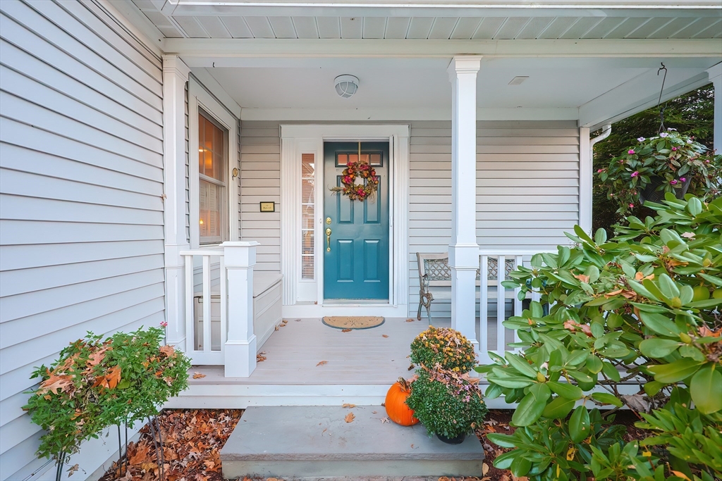 12 Highcroft Way, Unit 12 Hopkinton, MA 01748 - Photo 2 of 37 a front view of a house with a garden