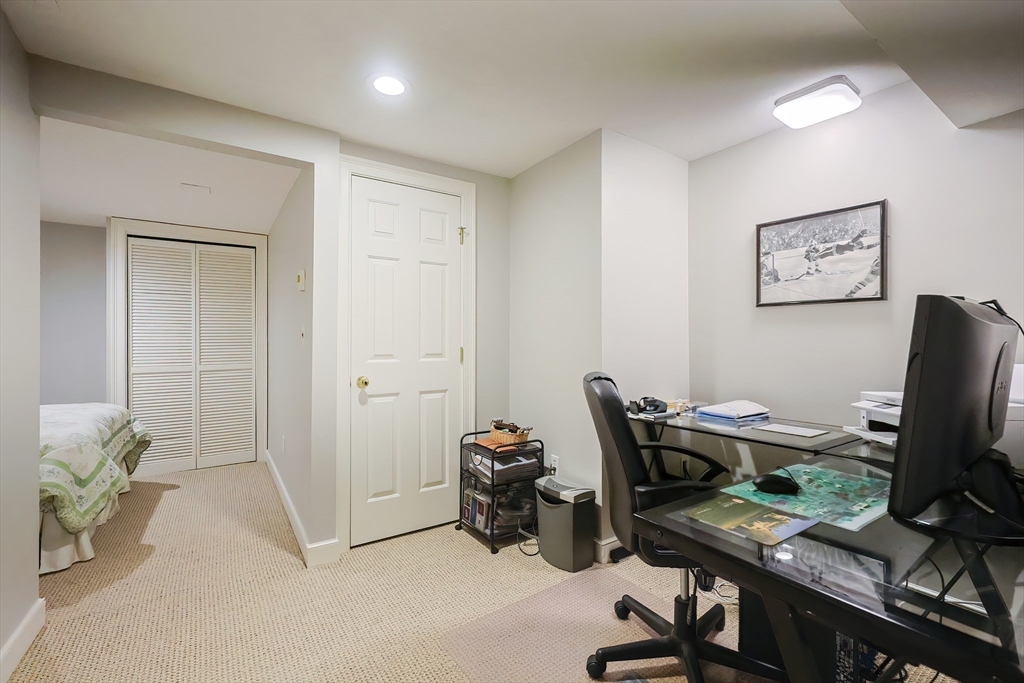 12 Highcroft Way, Unit 12 Hopkinton, MA 01748 - Photo 33 of 37 a workspace with furniture and wooden floor