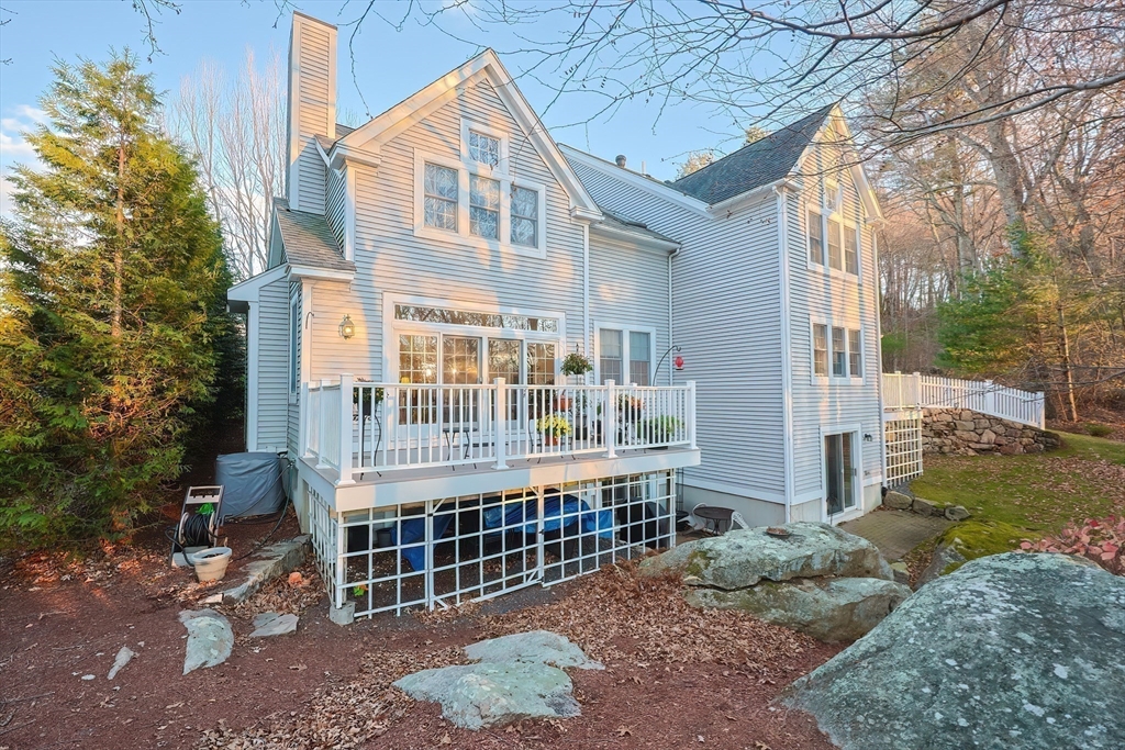 12 Highcroft Way, Unit 12 Hopkinton, MA 01748 - Photo 37 of 37 a front view of a house with a yard