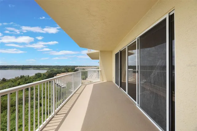 a view of balcony with furniture