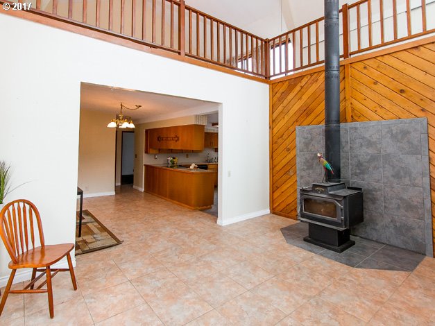 19495 Southeast Chambers Road Sandy, OR 97055 - Photo 13 of 32 a view of a hallway with furniture and front door
