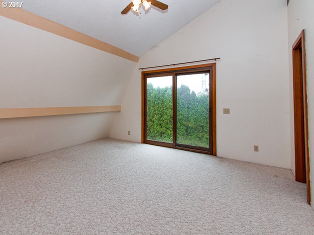 19495 Southeast Chambers Road Sandy, OR 97055 - Photo 18 of 32 a view of an empty room with windows