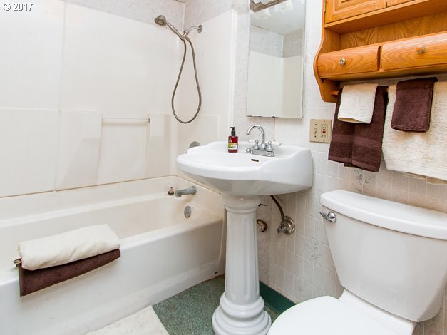 19495 Southeast Chambers Road Sandy, OR 97055 - Photo 9 of 32 a bathroom with a sink toilet and shower