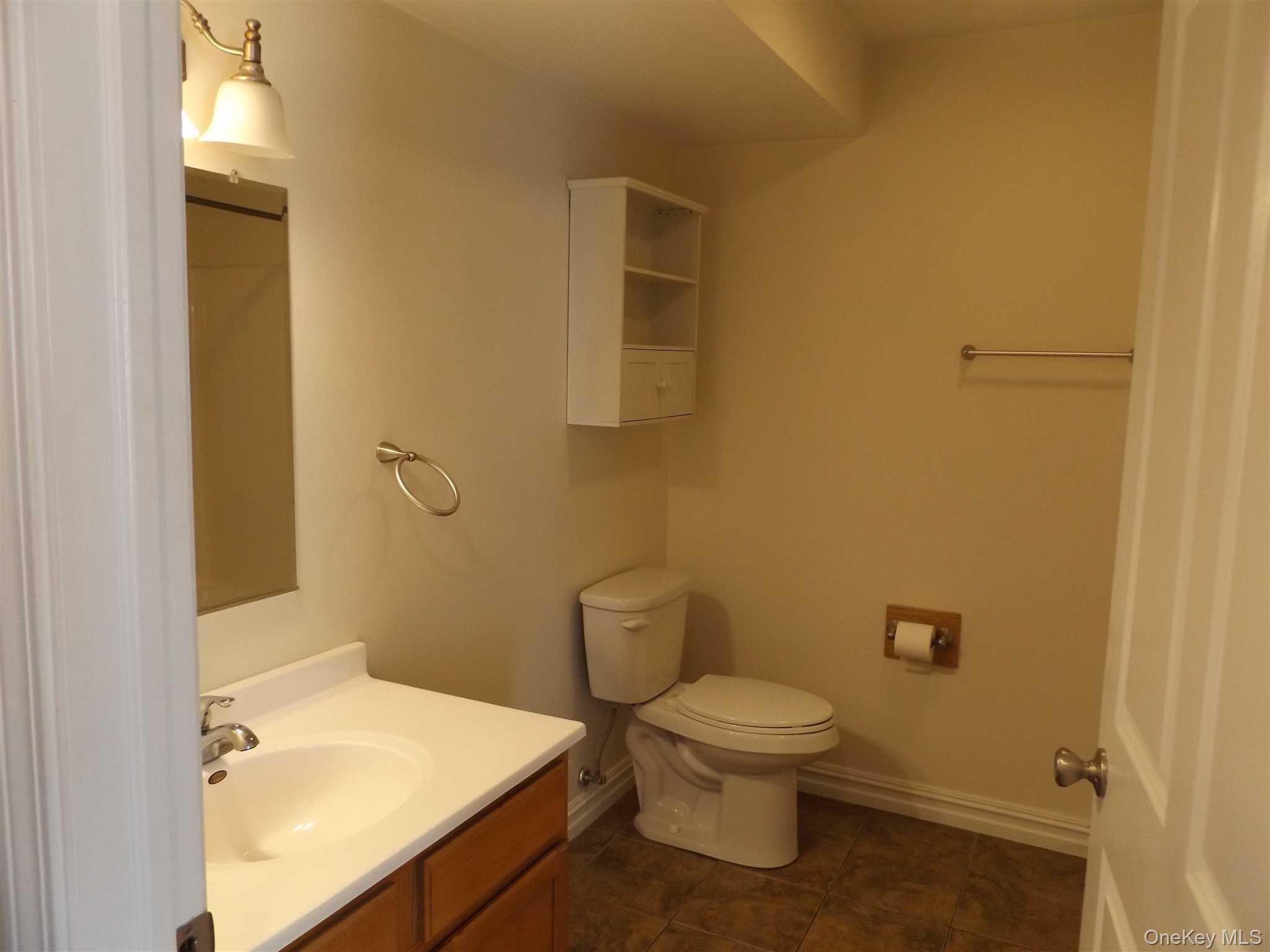 4 State Street, Unit 1 Beacon, NY 12508 - Photo 11 of 17 a bathroom with a sink and toilet