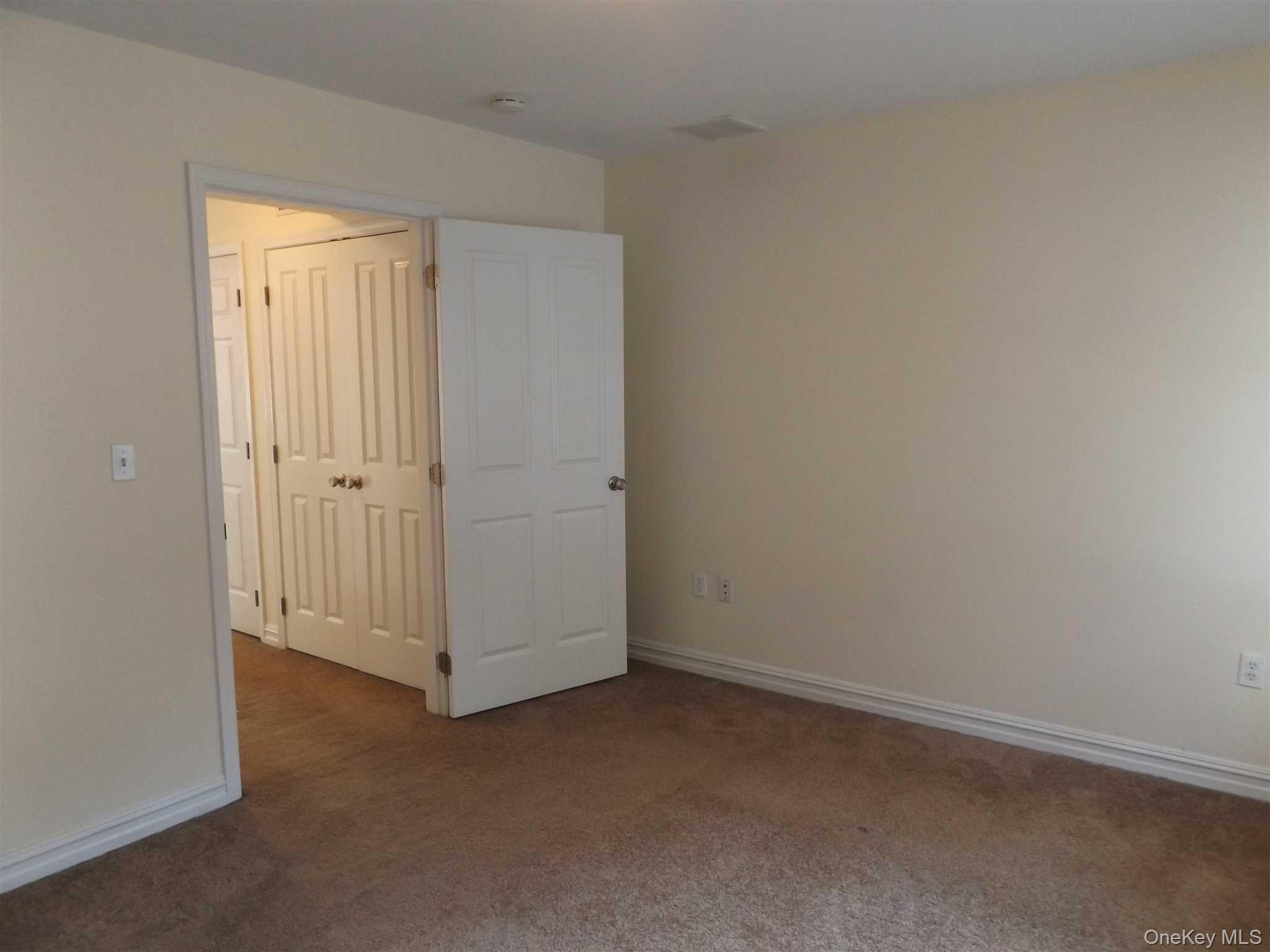 4 State Street, Unit 1 Beacon, NY 12508 - Photo 13 of 17 an empty room with closet area