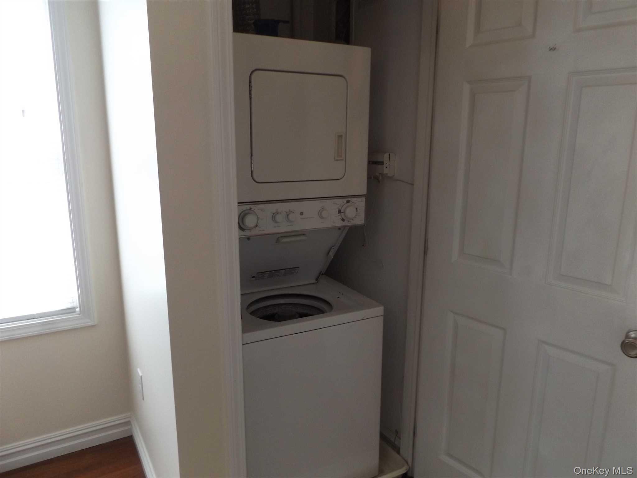 4 State Street, Unit 1 Beacon, NY 12508 - Photo 10 of 17 a utility room with dryer and washer