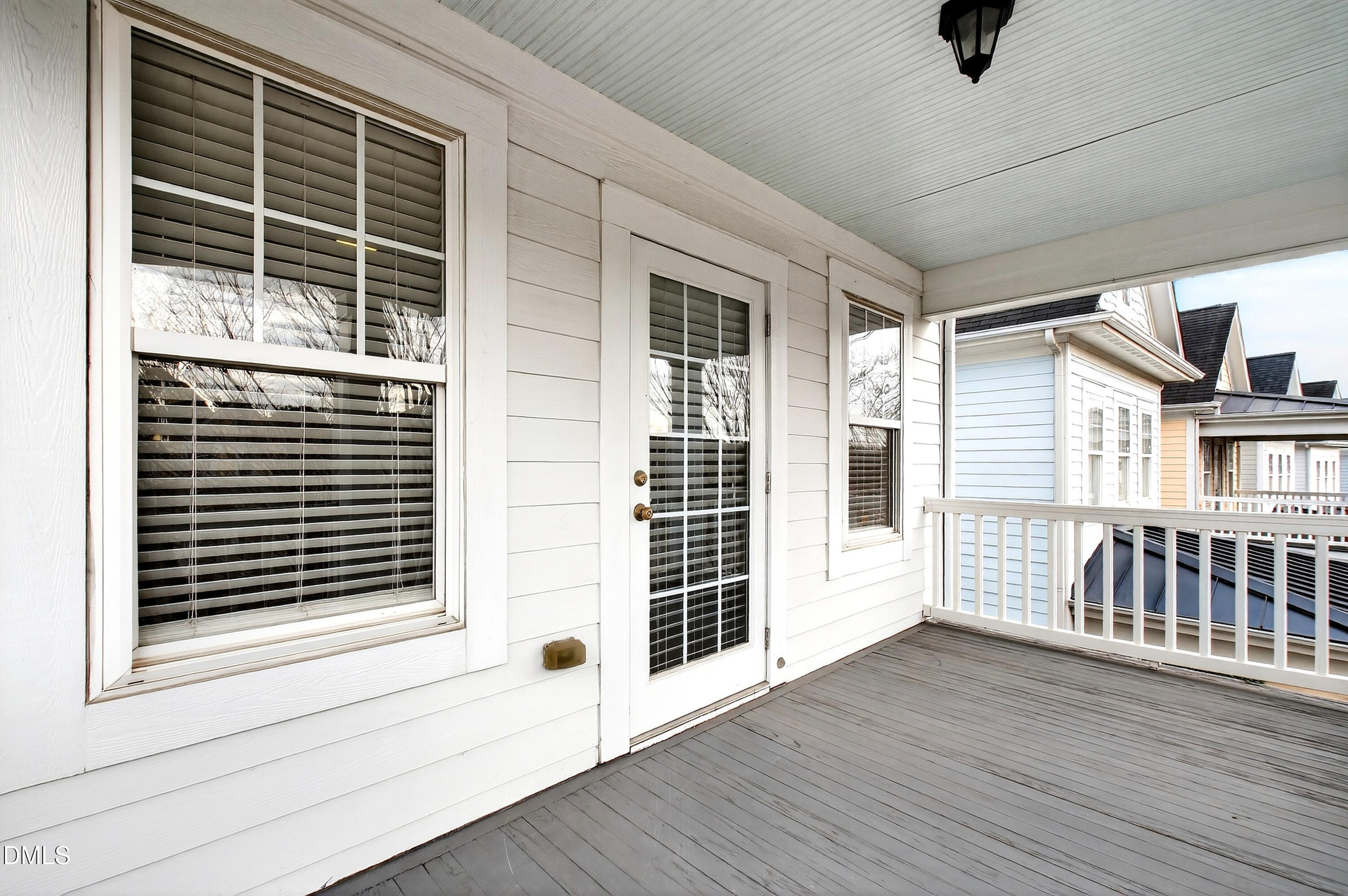 7756 ACC Boulevard Raleigh, NC 27617 - Photo 28 of 40 a view of an empty room with wooden floor and a window
