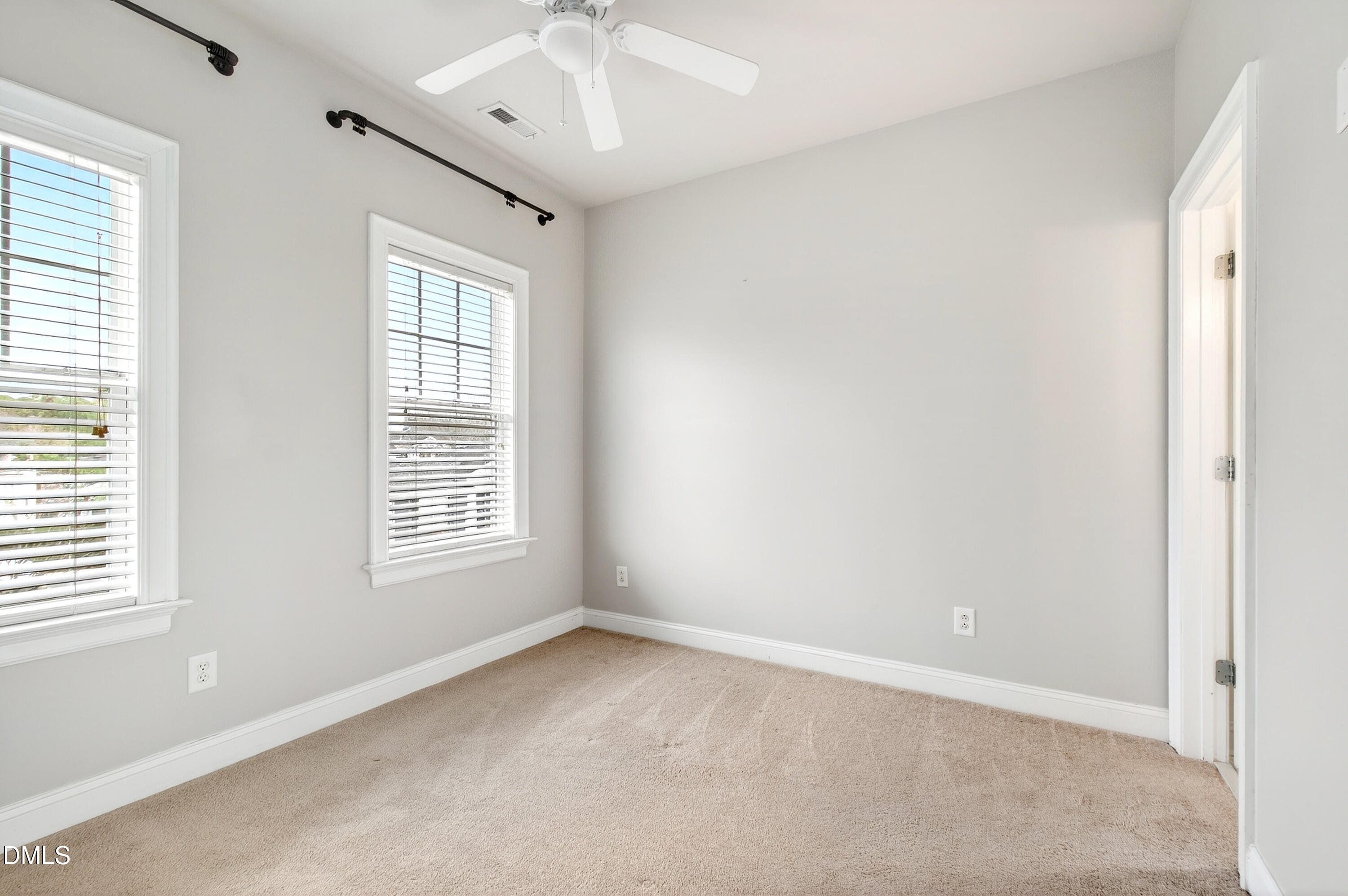 7756 ACC Boulevard Raleigh, NC 27617 - Photo 29 of 40 an empty room with a window