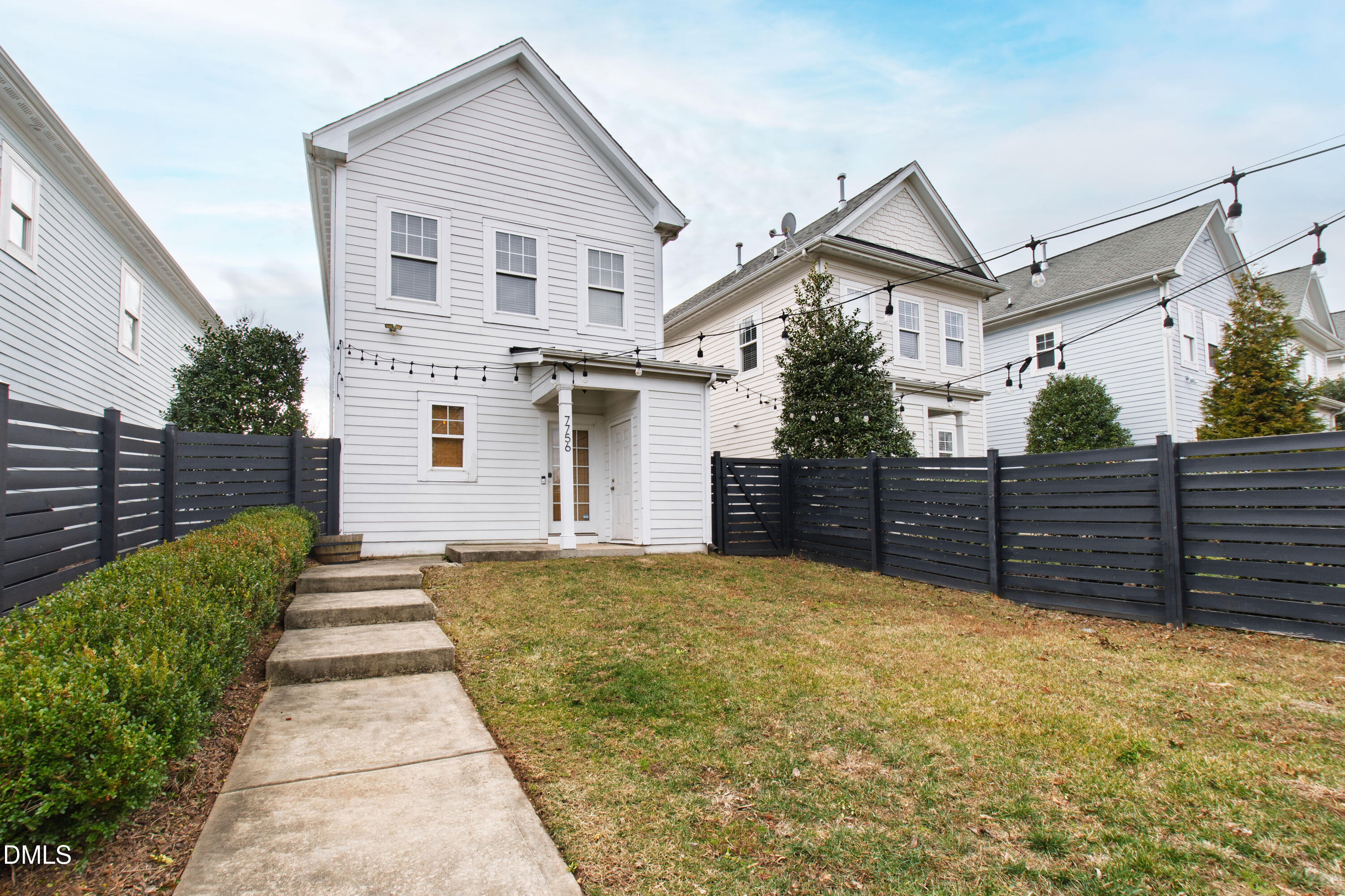 7756 ACC Boulevard Raleigh, NC 27617 - Photo 5 of 40 a view of a house with wooden fence