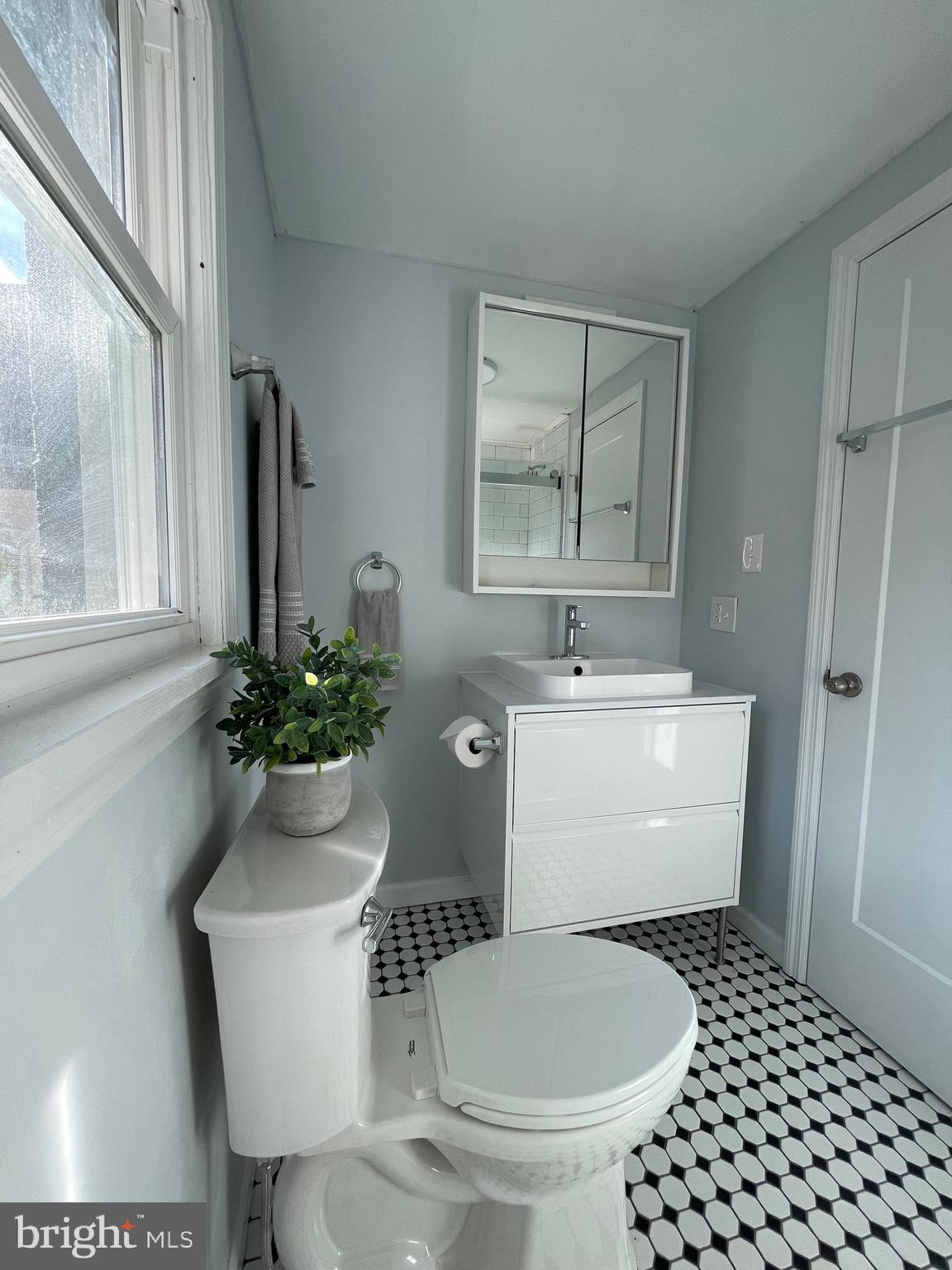 240 Whorton Hollow Road Castleton, VA 22716 - Photo 14 of 37 a bathroom with a sink toilet and shower