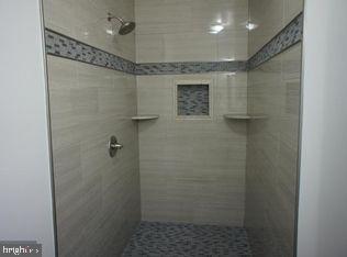 2312 Whitetail Court Reston, VA 20191 - Photo 14 of 26 a bathroom with a shower