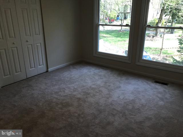 2312 Whitetail Court Reston, VA 20191 - Photo 9 of 26 a view of an empty room with a window