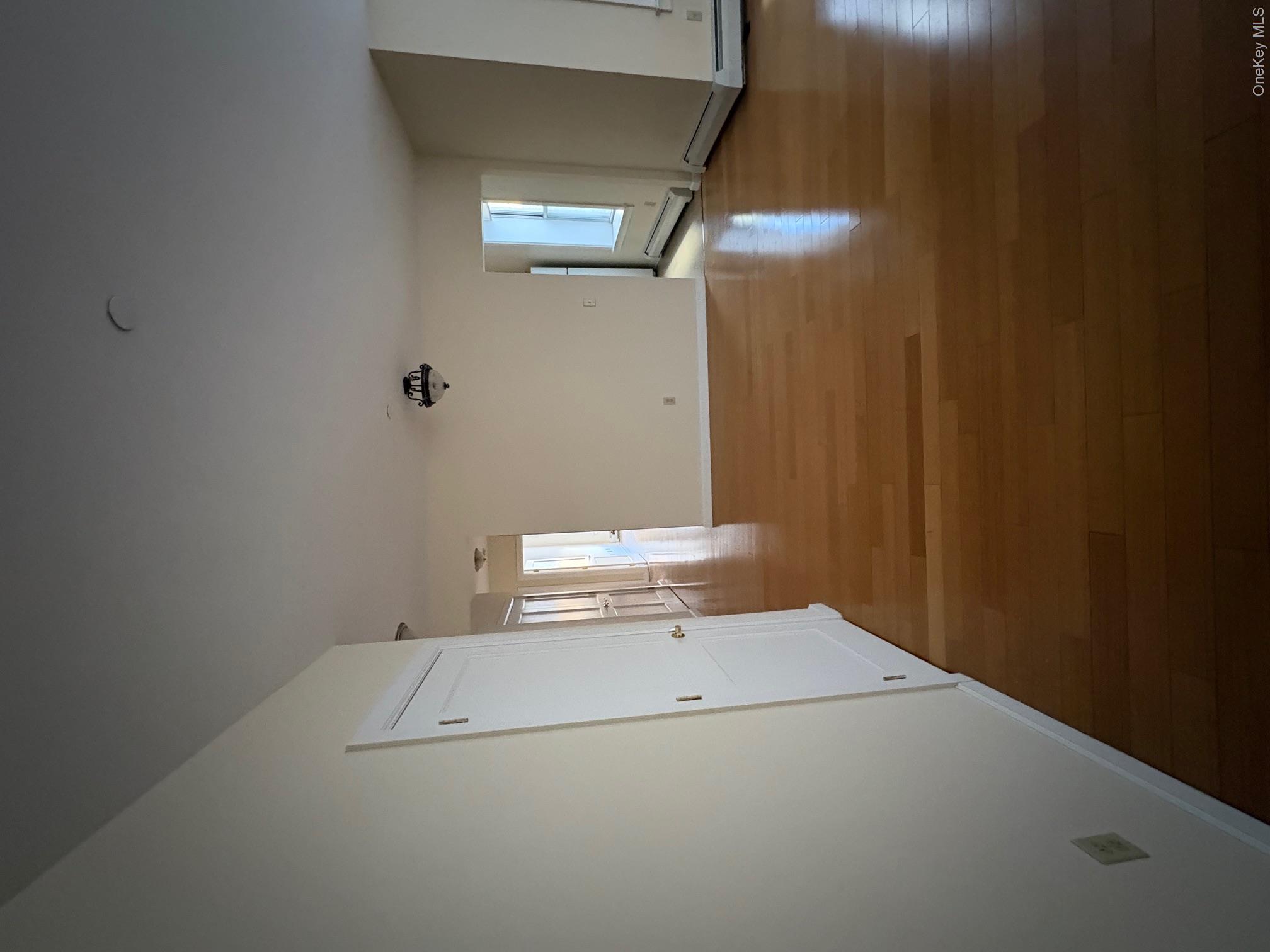 85 Bronx River Road, Unit 3S Yonkers, NY 10704 - Photo 12 of 27 Facing kitchen and closets with beautiful hardwood floors