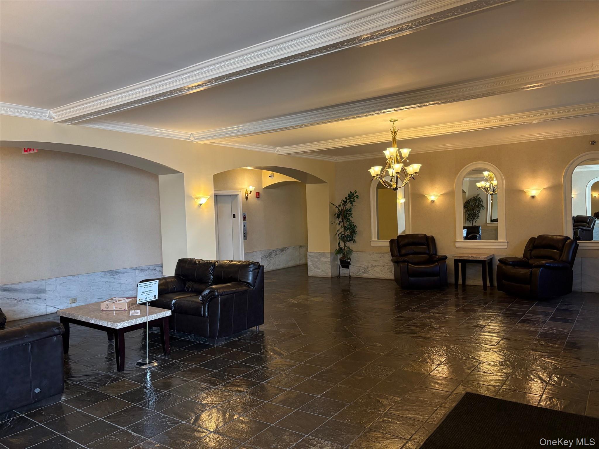 85 Bronx River Road, Unit 3S Yonkers, NY 10704 - Photo 5 of 27 Community lobby with crown molding