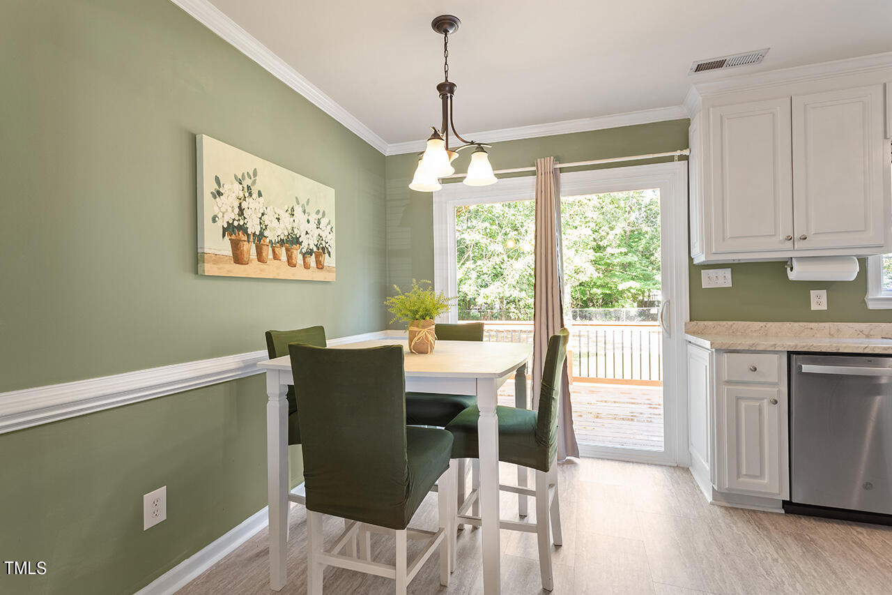 2001 Eagle View Drive Wendell, NC 27591 - Photo 14 of 33 a view of a dining room with furniture window and wooden floor
