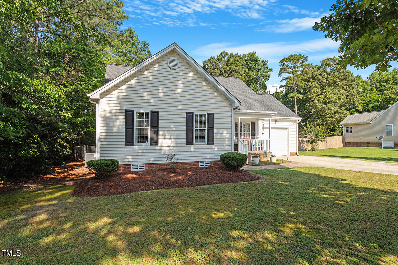 2001 Eagle View Drive Wendell, NC 27591 - Photo 2 of 33 a view of house with outdoor space area and garden