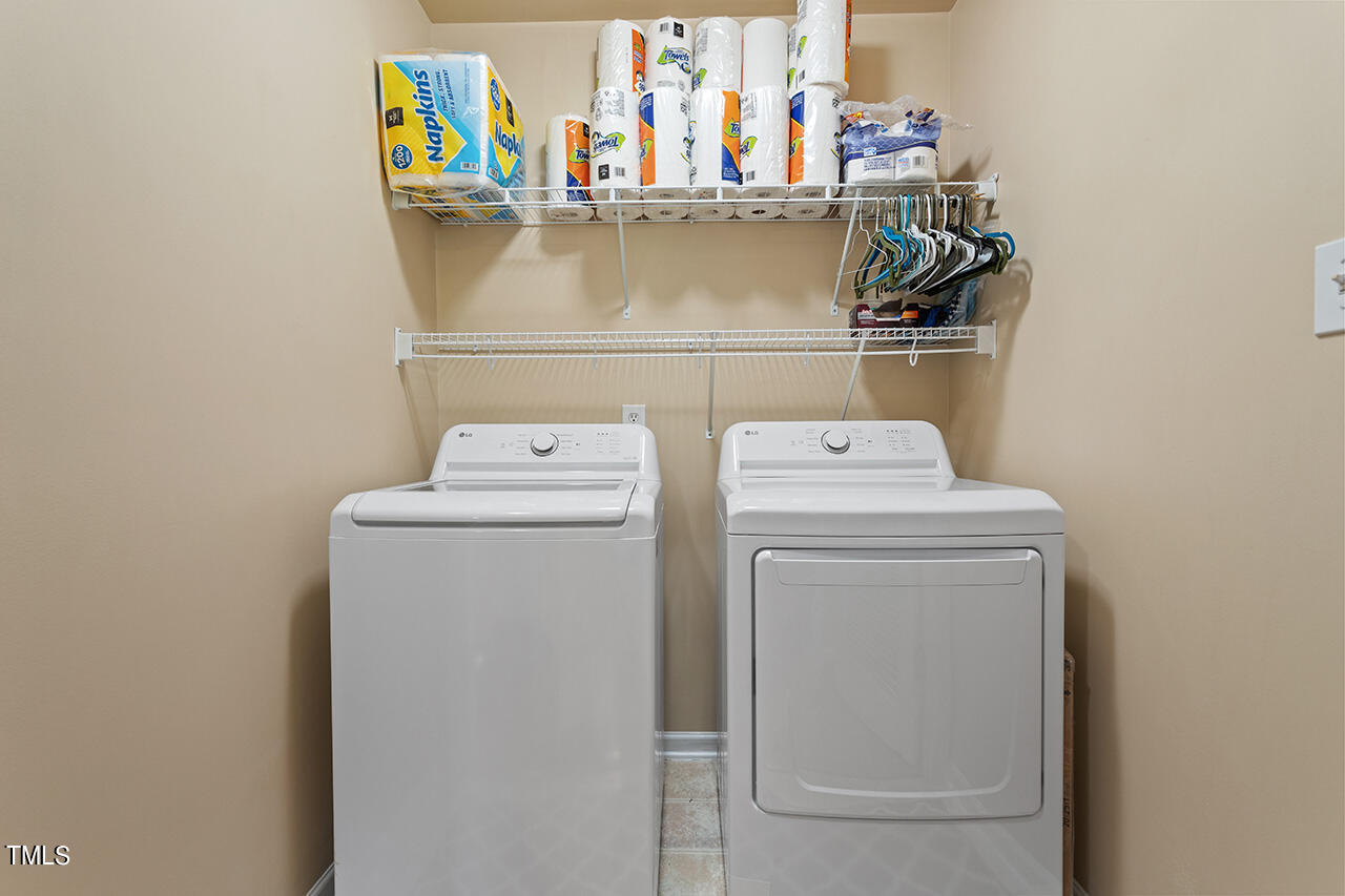 2001 Eagle View Drive Wendell, NC 27591 - Photo 27 of 33 a utility room with dryer and washer