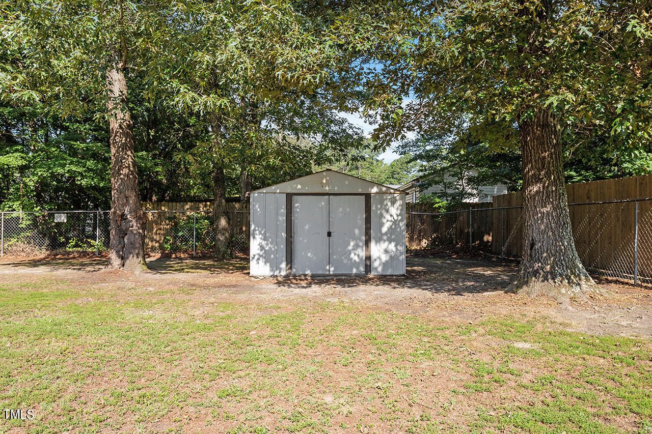 2001 Eagle View Drive Wendell, NC 27591 - Photo 31 of 33 a wooden fence with trees in front of it
