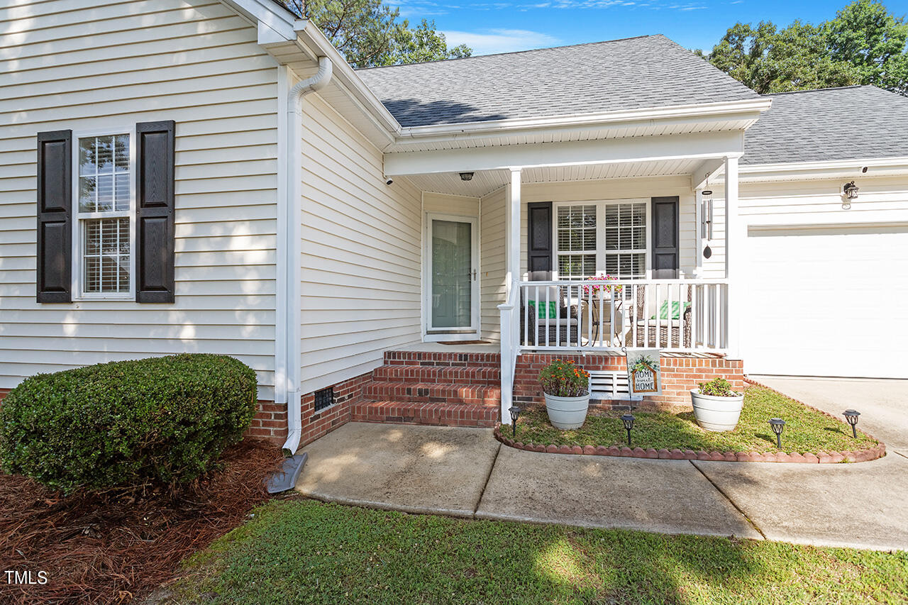 2001 Eagle View Drive Wendell, NC 27591 - Photo 6 of 33 a front view of a house with garden