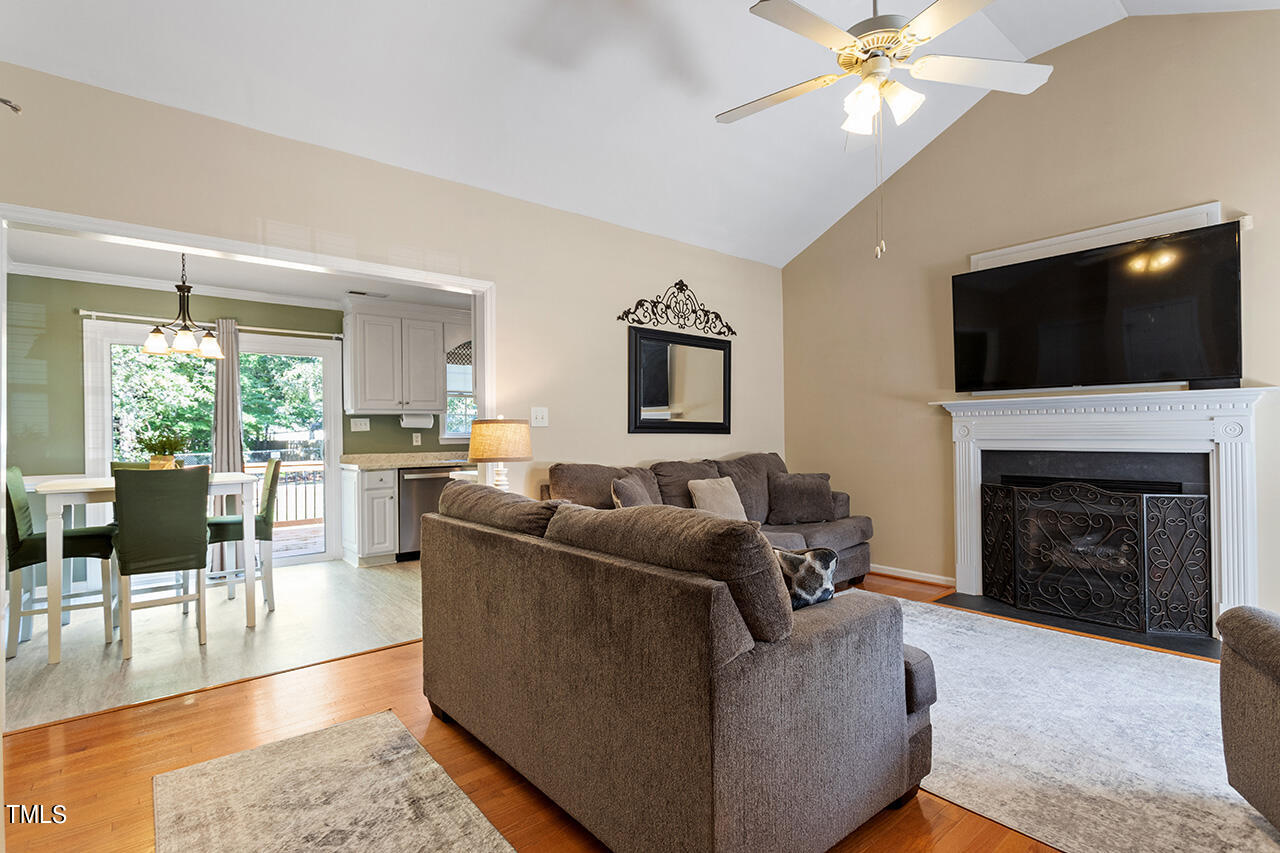 2001 Eagle View Drive Wendell, NC 27591 - Photo 8 of 33 a living room with furniture a flat screen tv and a fireplace