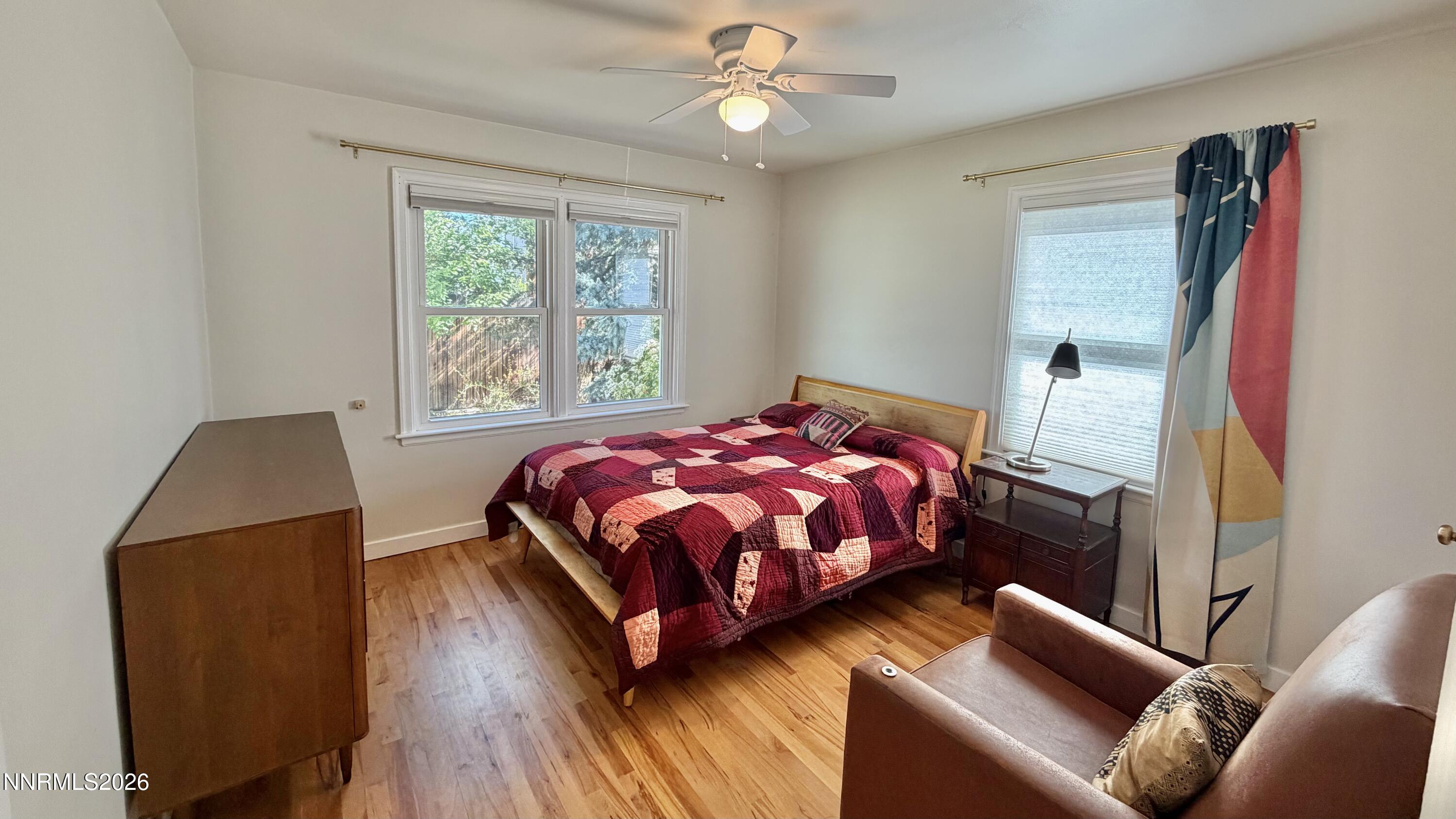 525 East Taylor Street Reno, NV 89502 - Photo 12 of 30 a bedroom with a bed and a window
