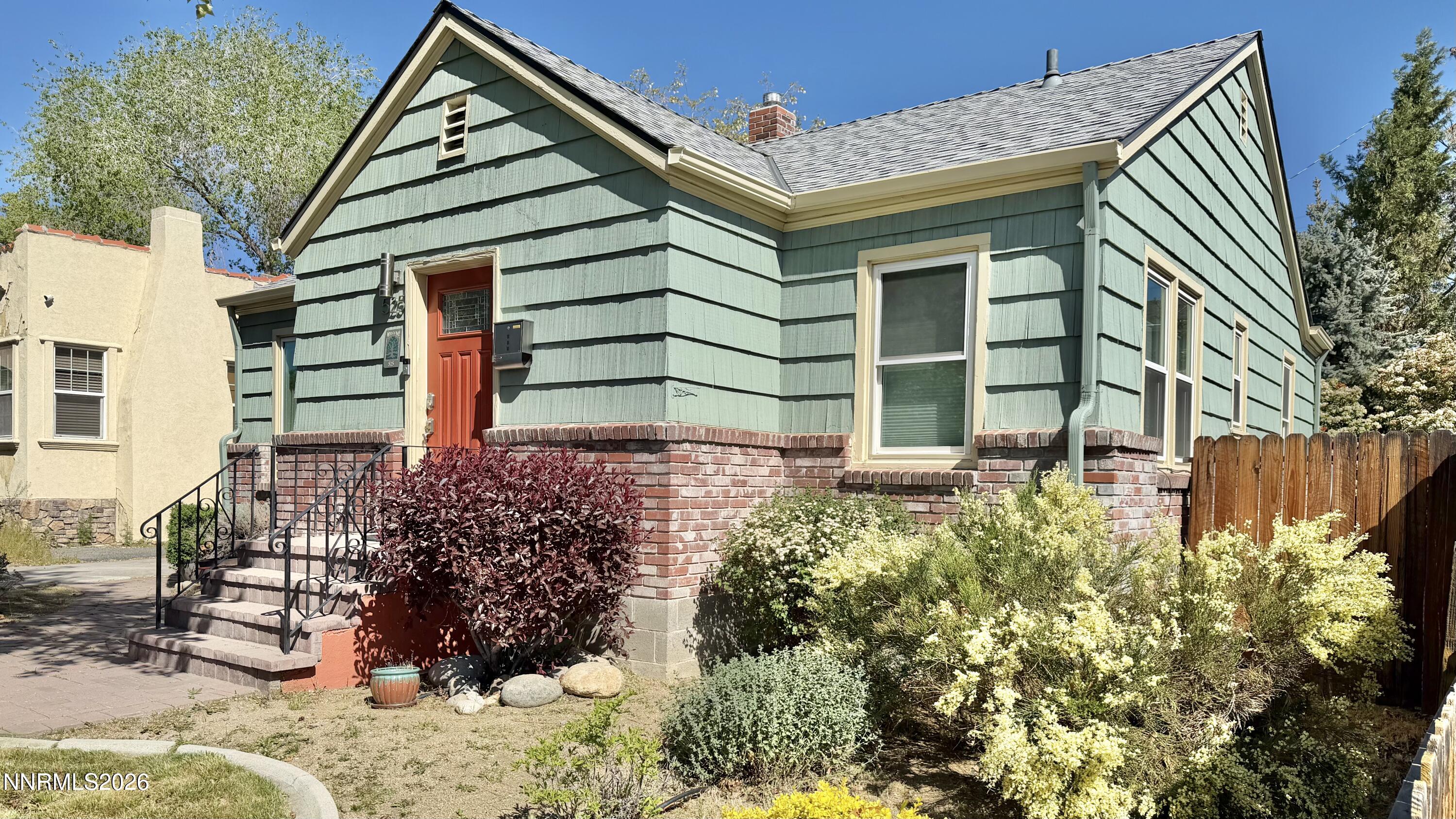 525 East Taylor Street Reno, NV 89502 - Photo 2 of 30 a front view of a house with a yard