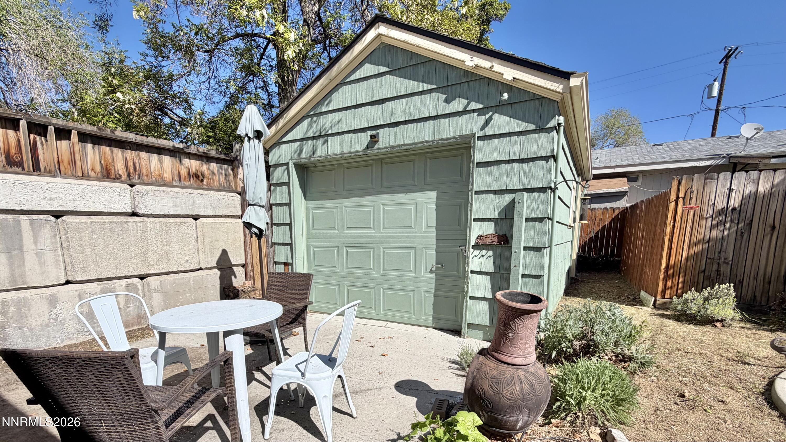 525 East Taylor Street Reno, NV 89502 - Photo 22 of 30 a backyard of a house with table and chairs