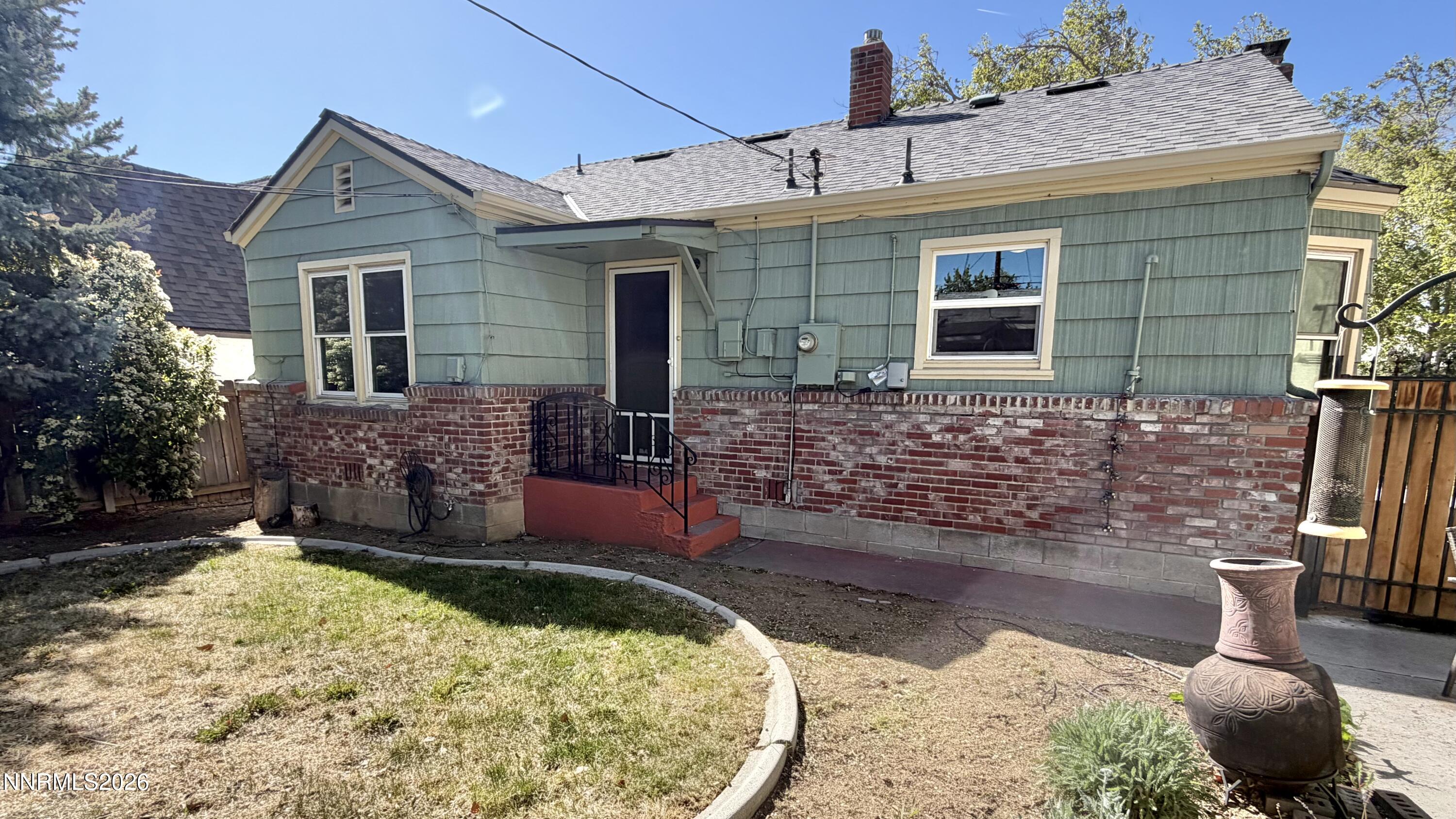 525 East Taylor Street Reno, NV 89502 - Photo 27 of 30 a backyard of a house with yard fire pit and outdoor seating