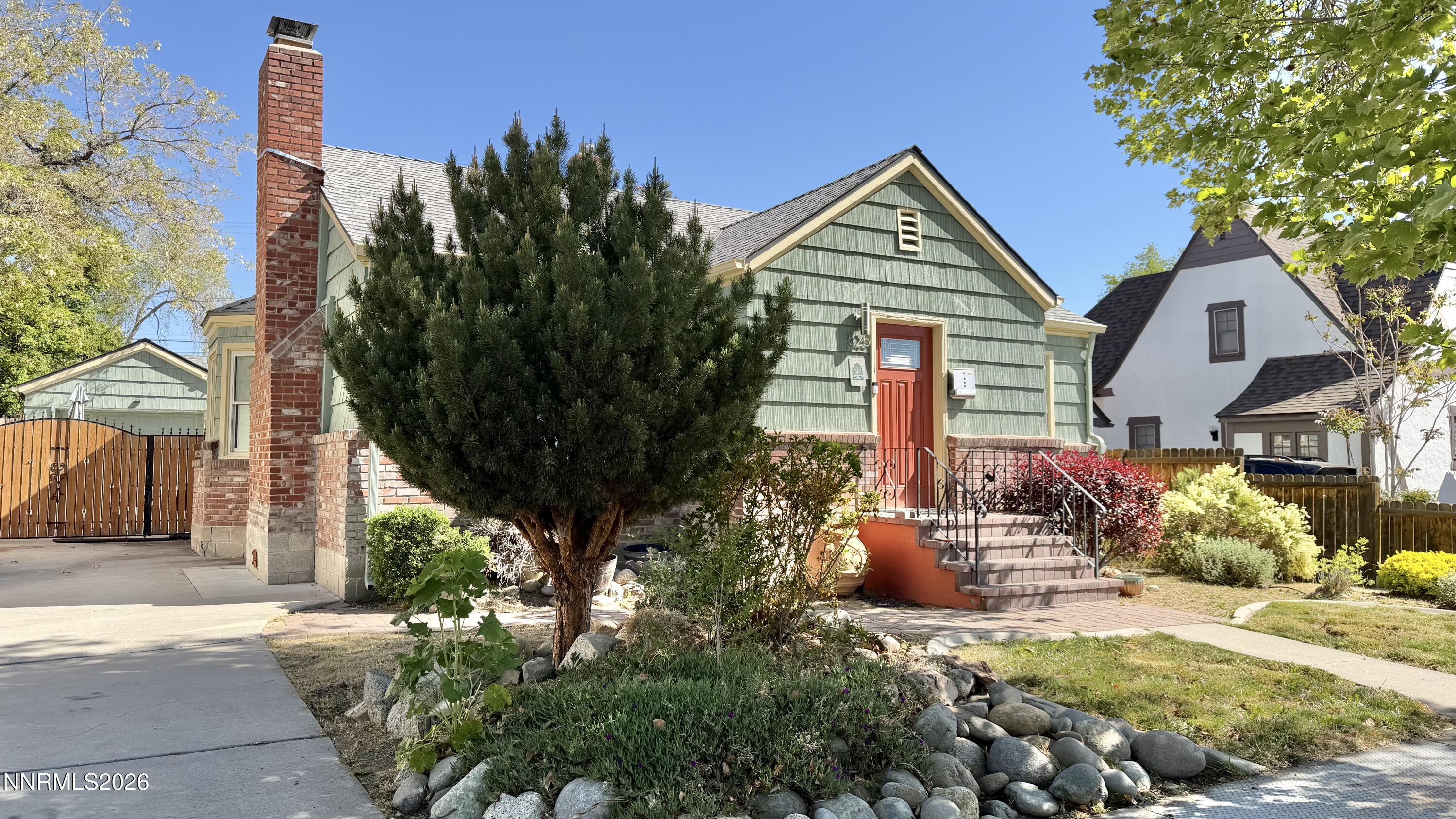 525 East Taylor Street Reno, NV 89502 - Photo 29 of 30 a view of a house with a small yard and potted plants