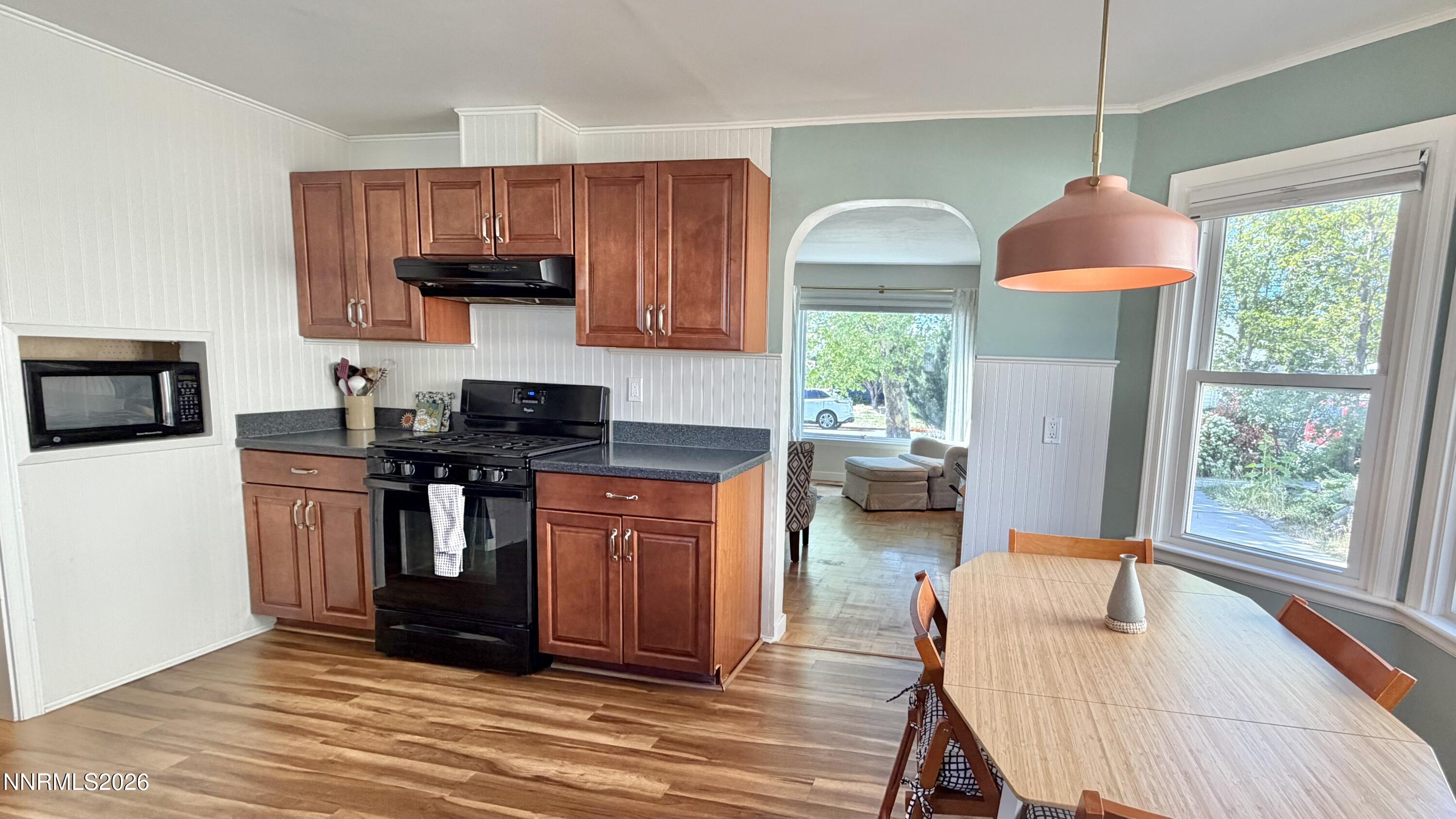 525 East Taylor Street Reno, NV 89502 - Photo 10 of 30 a kitchen with stainless steel appliances granite countertop a stove a sink dishwasher a microwave oven with granite countertops and cabinets