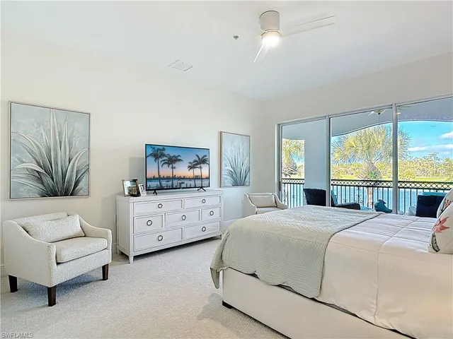 a bathroom with a shower sink and mirror