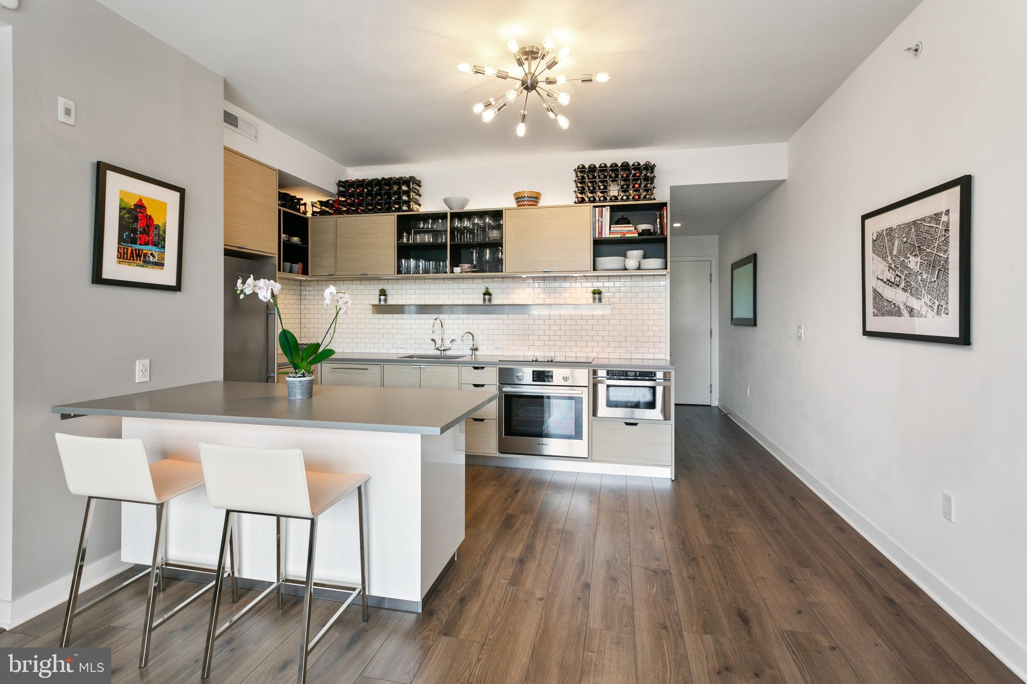 2030 8th Street Northwest, Unit 209 Washington, DC 20001 - Photo 6 of 29 Kitchen with custom breakfast bar