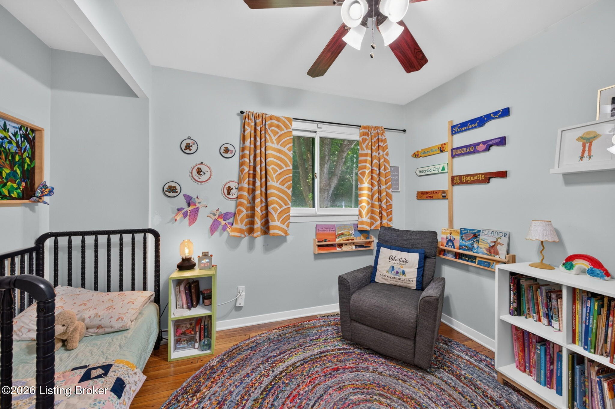 2104 North Rose Island Road Prospect, KY 40059 - Photo 32 of 57 An additional bedroom overlooks the backyard and offers a standard closet, smooth-finish ceiling, and a ceiling fan with a light fixture