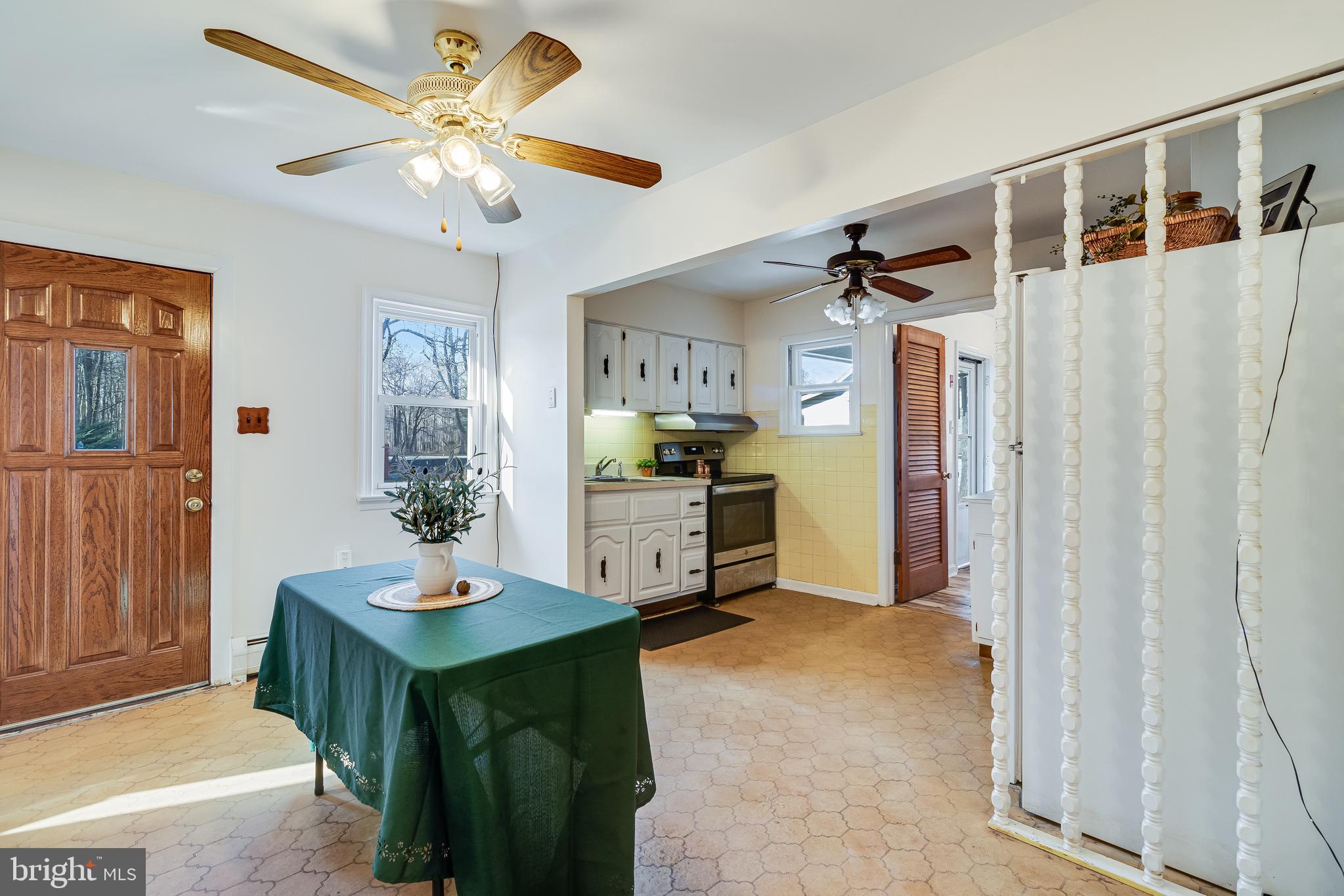 965 Franklin Manor Road Churchton, MD 20733 - Photo 13 of 34 a view of kitchen with furniture and wooden floor