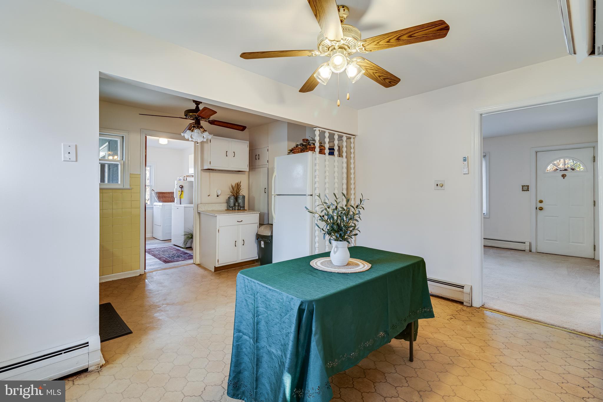 965 Franklin Manor Road Churchton, MD 20733 - Photo 14 of 34 a bedroom with a bed and a chandelier