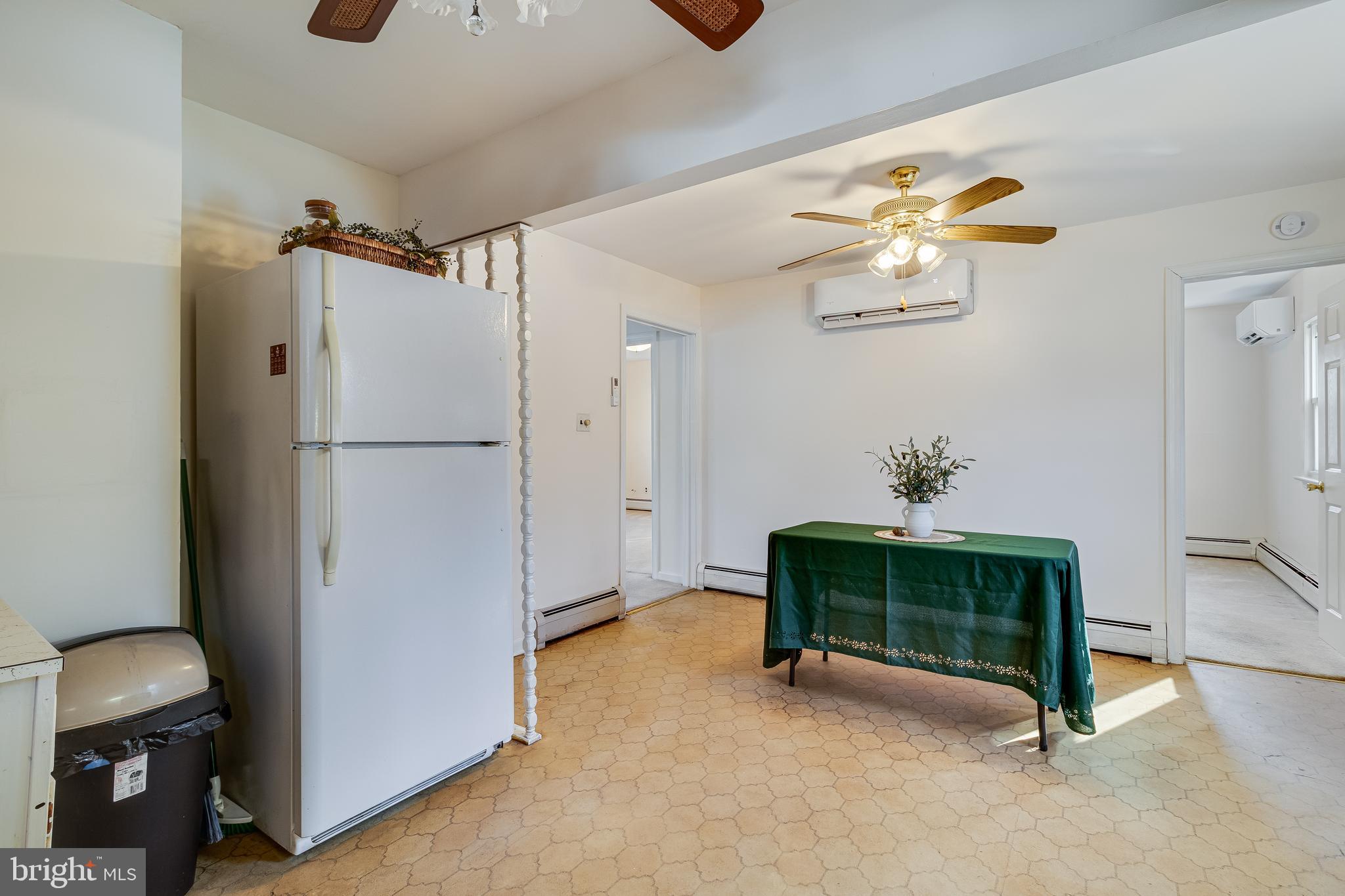 965 Franklin Manor Road Churchton, MD 20733 - Photo 18 of 34 a view of a workspace with furniture and a window